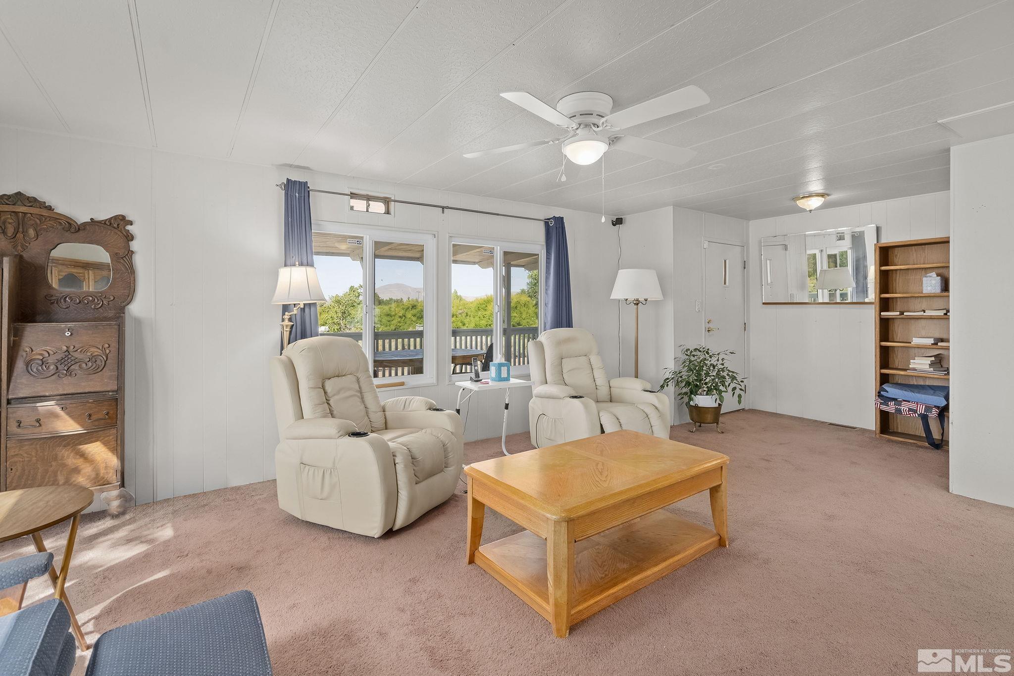 500 Mira Street Reno, NV 89521 - Photo 9 of 31 a living room with furniture and a large window