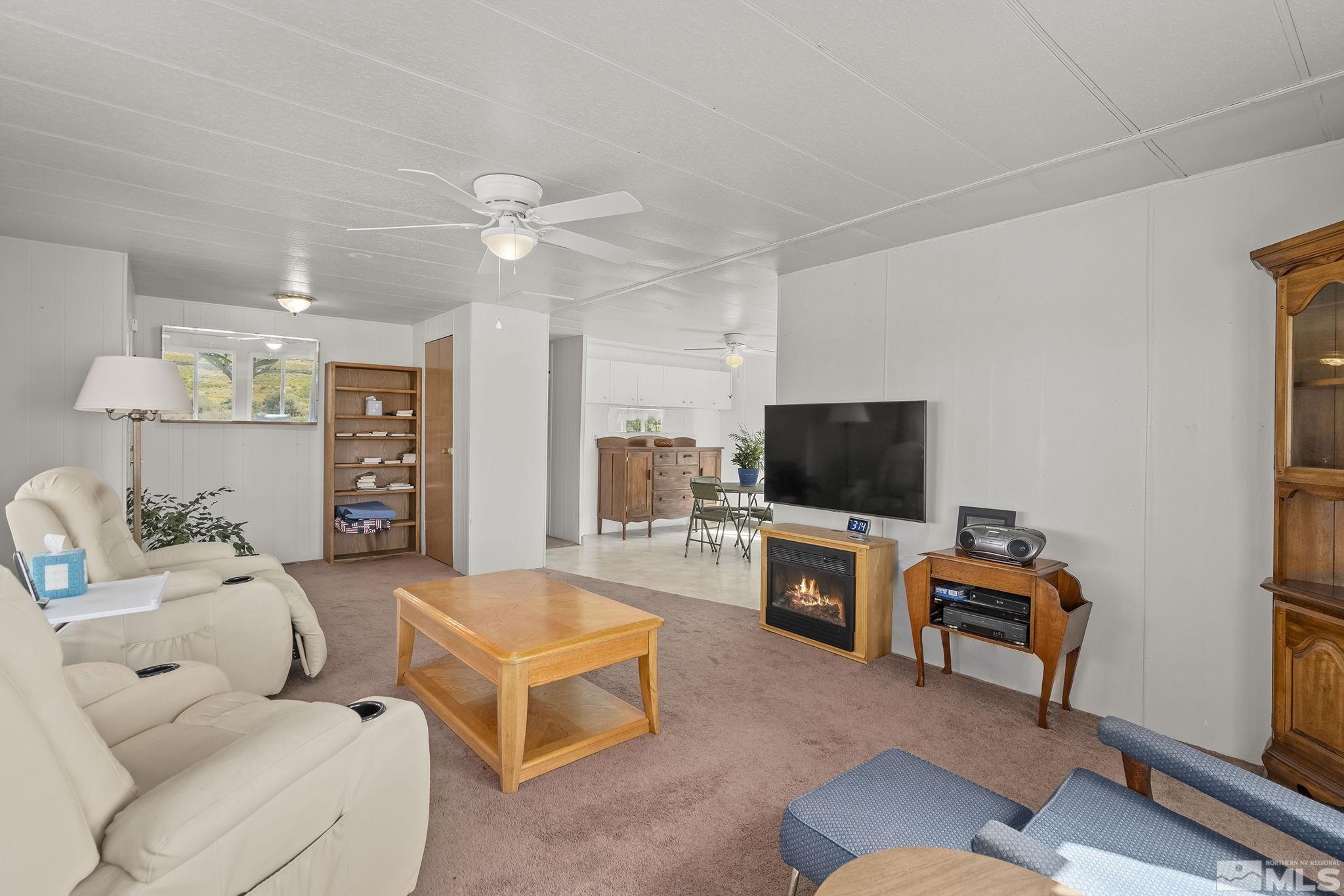 500 Mira Street Reno, NV 89521 - Photo 10 of 31 a living room with furniture and a flat screen tv