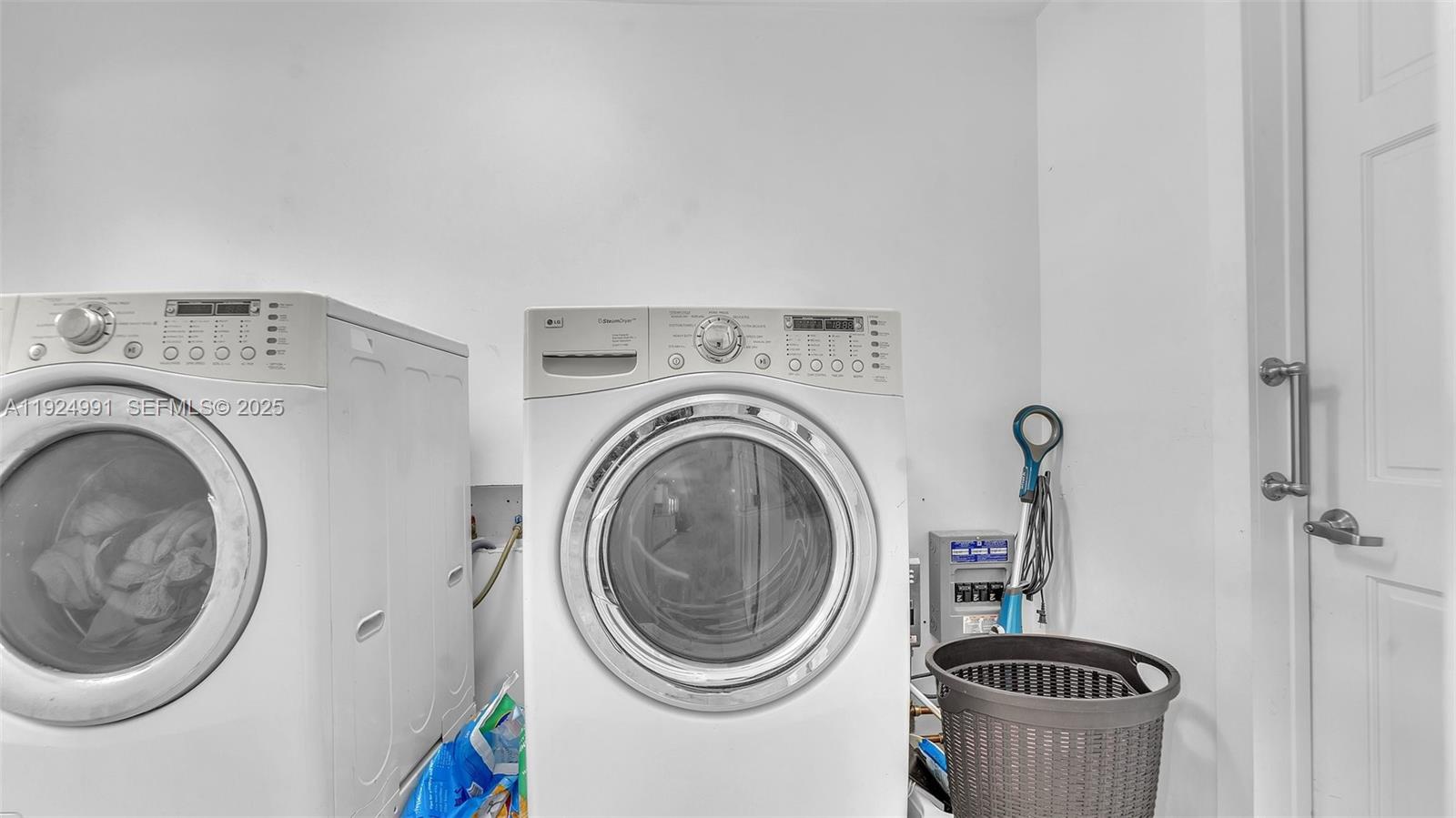 9220 Southwest 94th Place Miami, FL 33176 - Photo 12 of 67 a utility room with dryer and washer