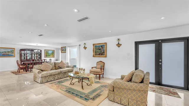a living room with furniture and a couch