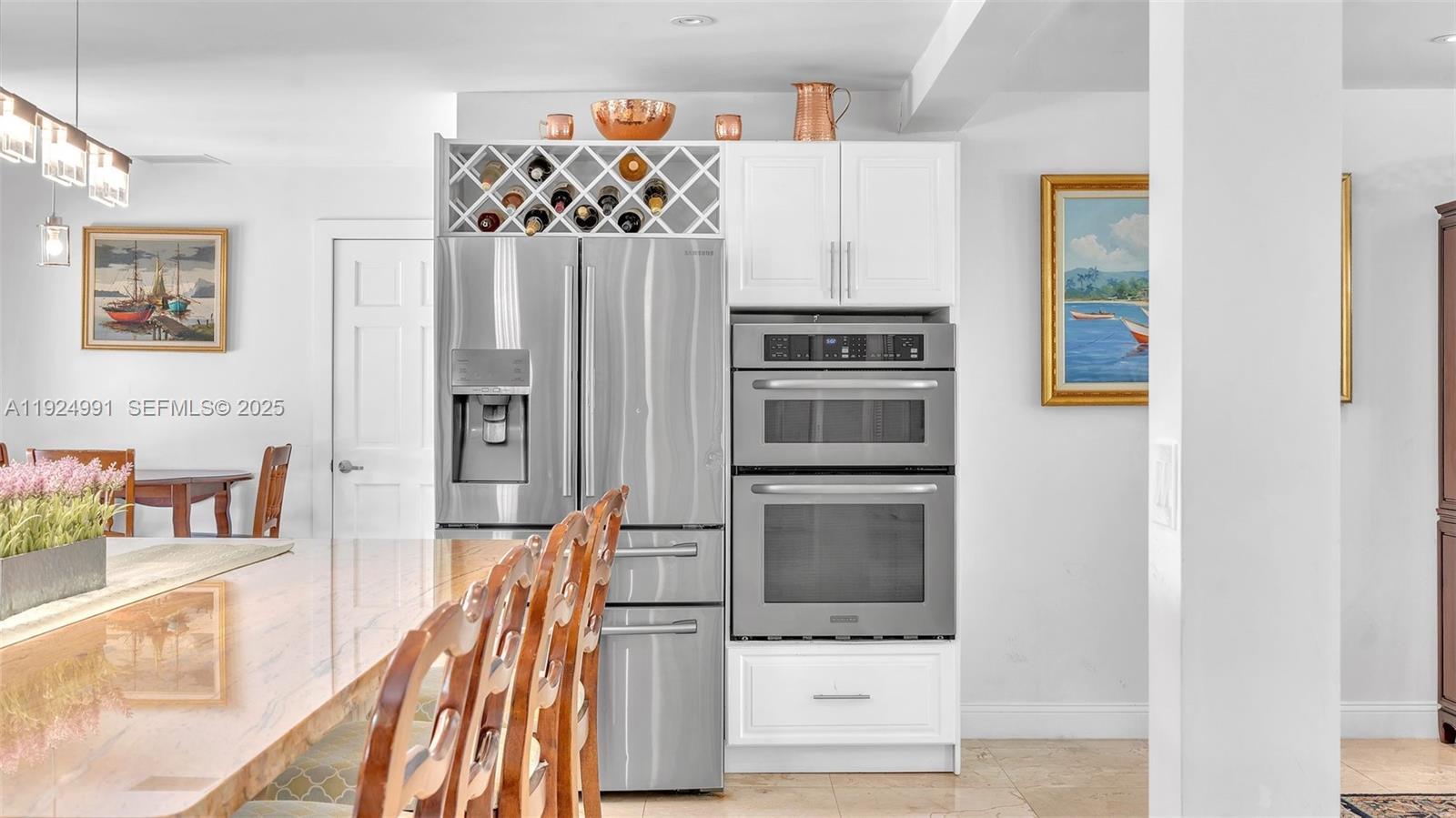 9220 Southwest 94th Place Miami, FL 33176 - Photo 38 of 67 a kitchen with stainless steel appliances a stove and a refrigerator