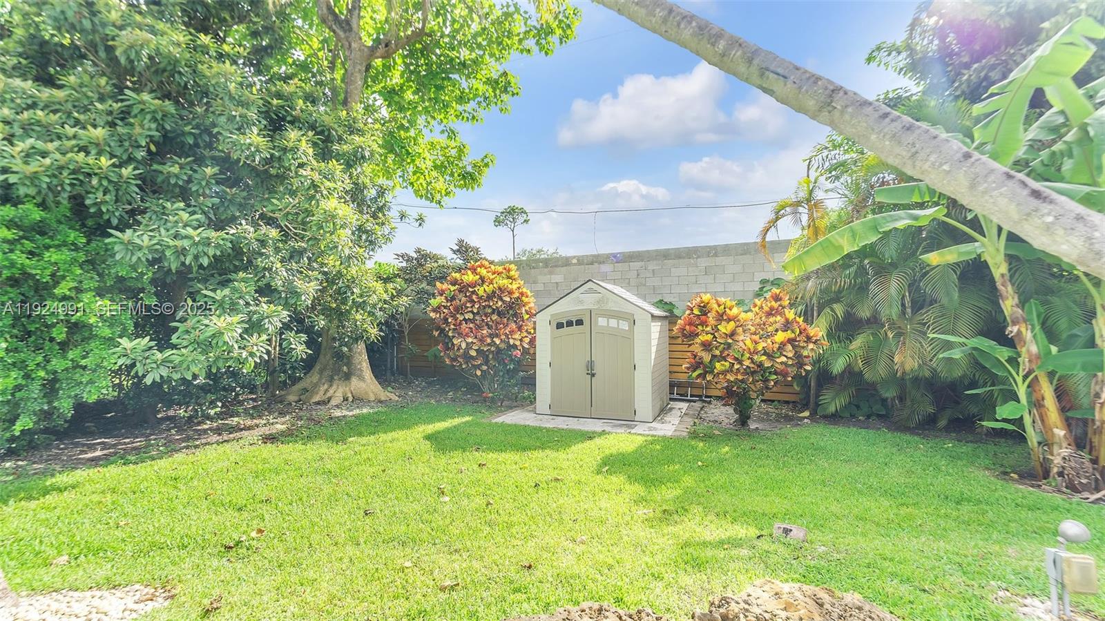 9220 Southwest 94th Place Miami, FL 33176 - Photo 52 of 67 a view of a back yard of the house
