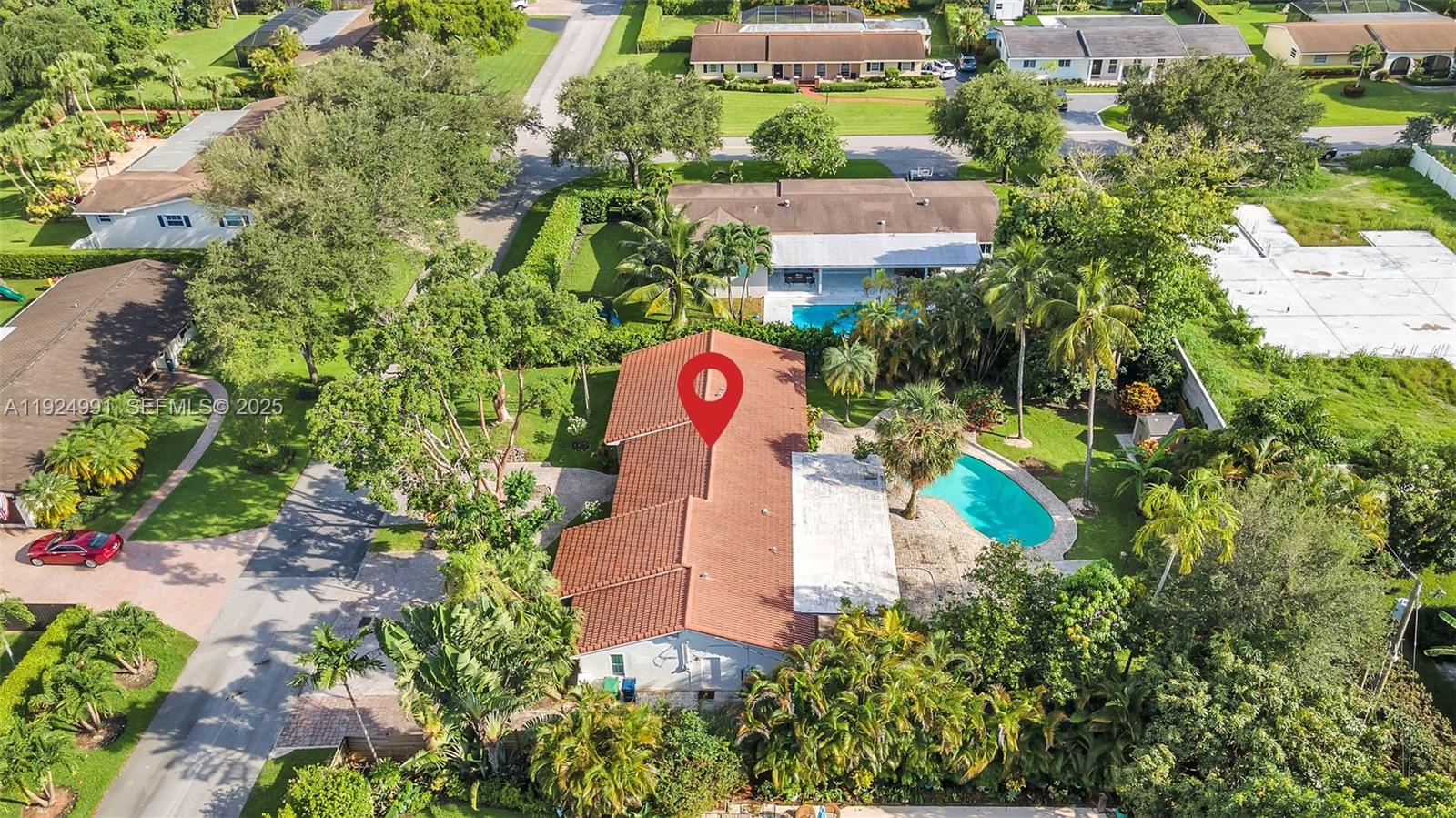 9220 Southwest 94th Place Miami, FL 33176 - Photo 67 of 67 an aerial view of a house with a swimming pool and garden