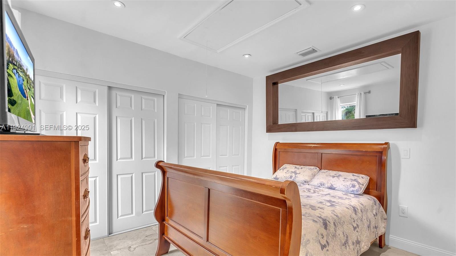 9220 Southwest 94th Place Miami, FL 33176 - Photo 10 of 67 a bed room with a bed and a window