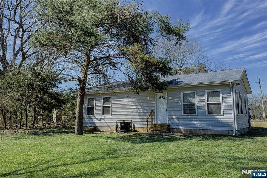434 Clarks Pond Road Bridgeton, NJ 08302 - Photo 16 of 17 a front view of a house with a garden