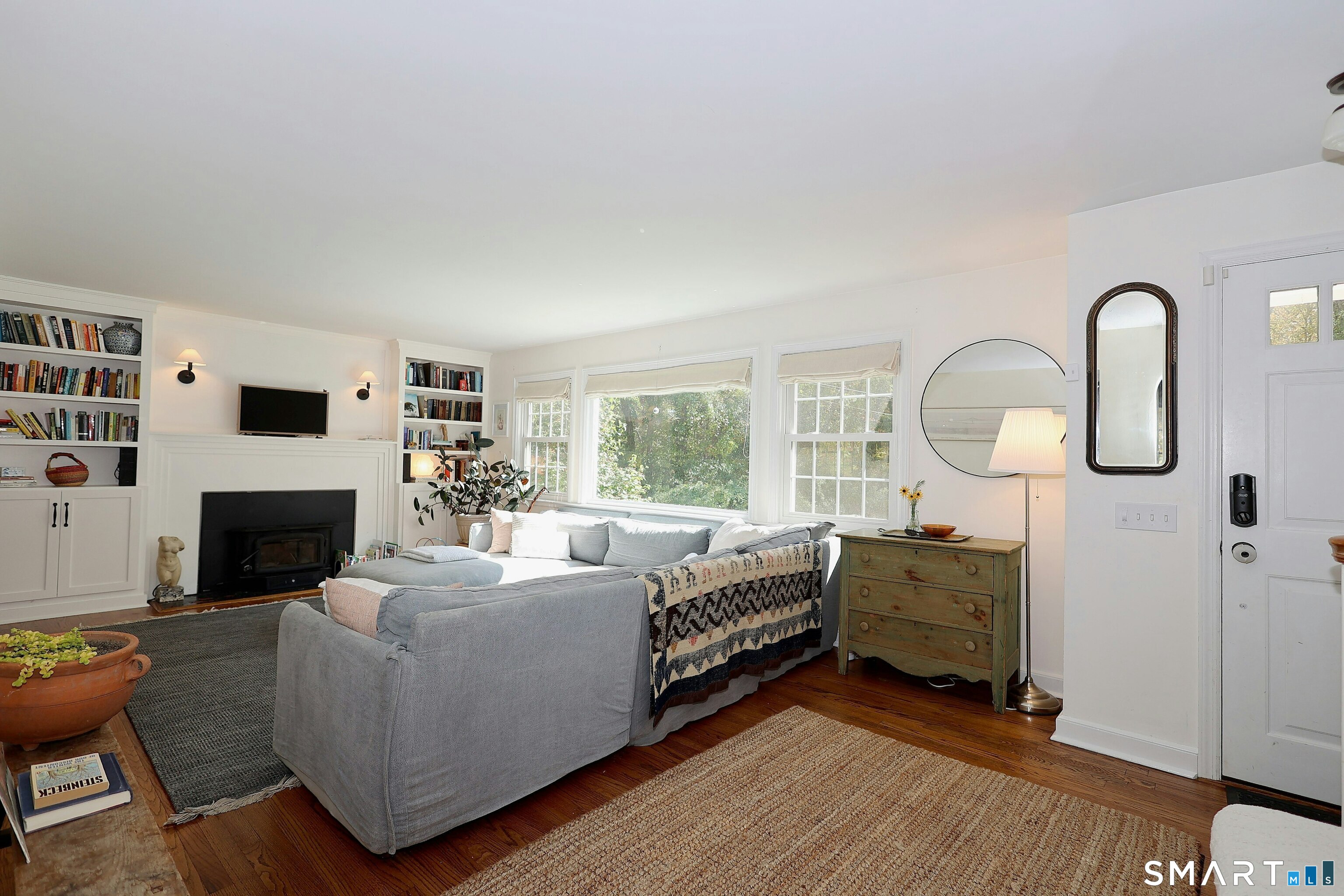 18 Head Of Meadow Road Newtown, CT 06470 - Photo 13 of 40 a living room with furniture fireplace and window
