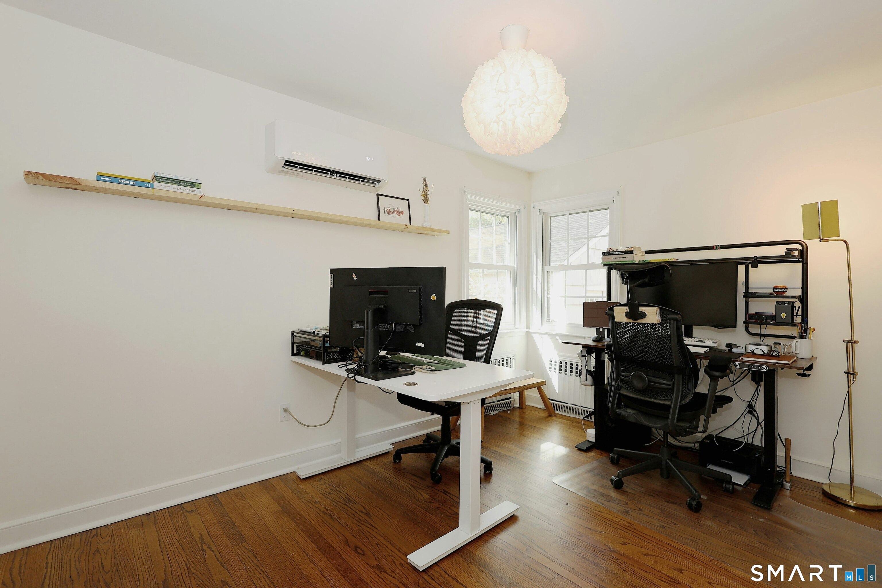 18 Head Of Meadow Road Newtown, CT 06470 - Photo 26 of 40 a view of a workspace with furniture and a window