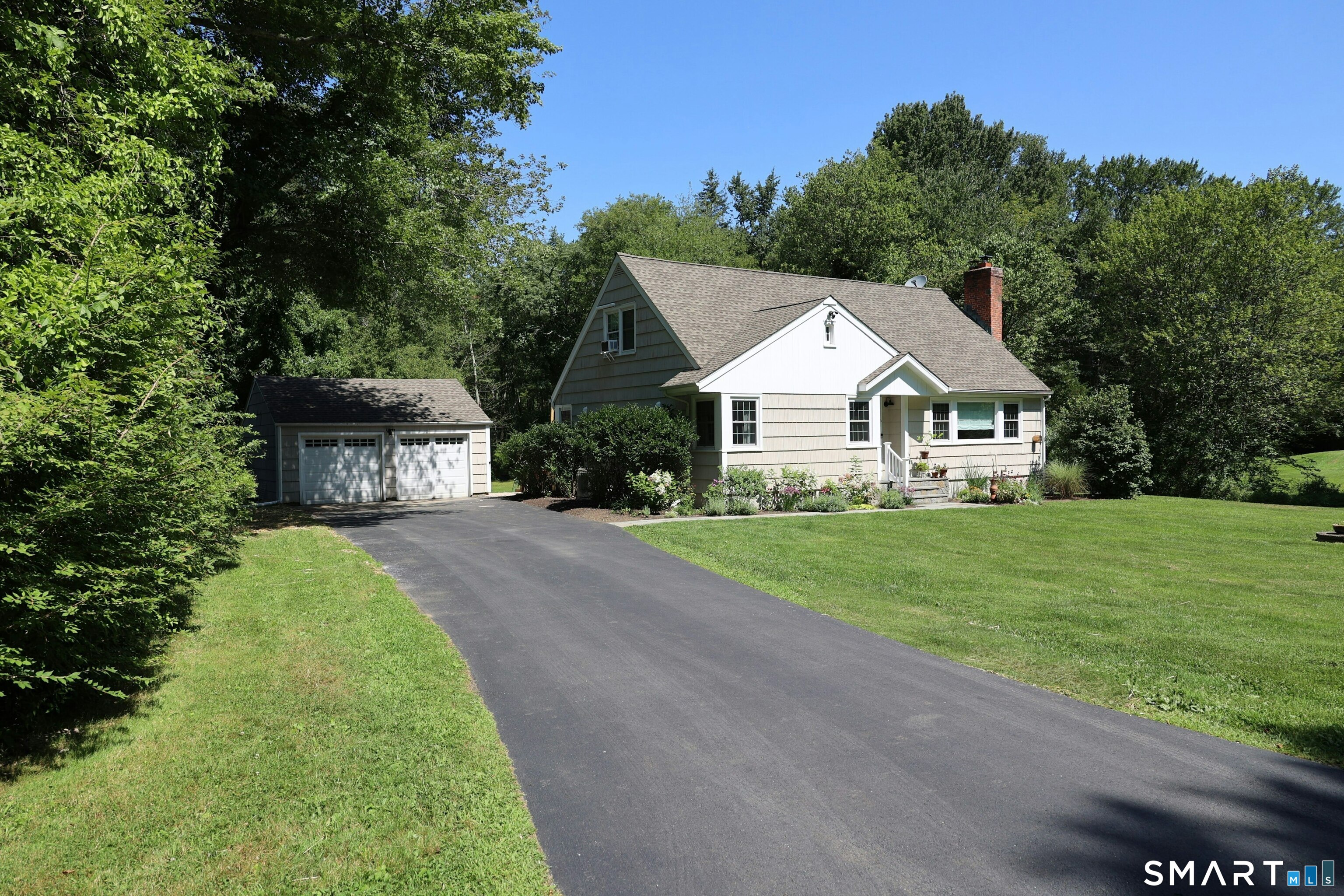 18 Head Of Meadow Road Newtown, CT 06470 - Photo 38 of 40 a view of house with garden and trees