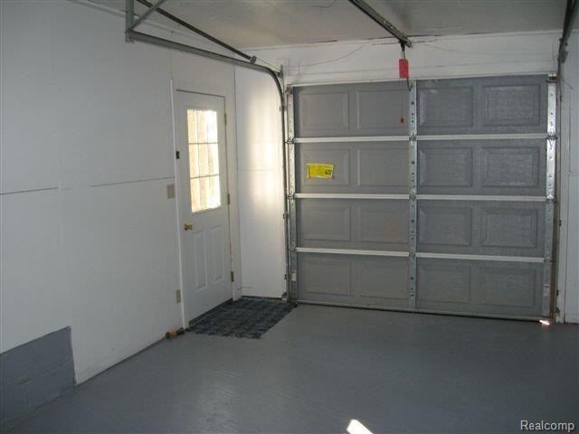 7679 Port Austin Road Pigeon, MI 48755 - Photo 9 of 11 finished and insulated garage