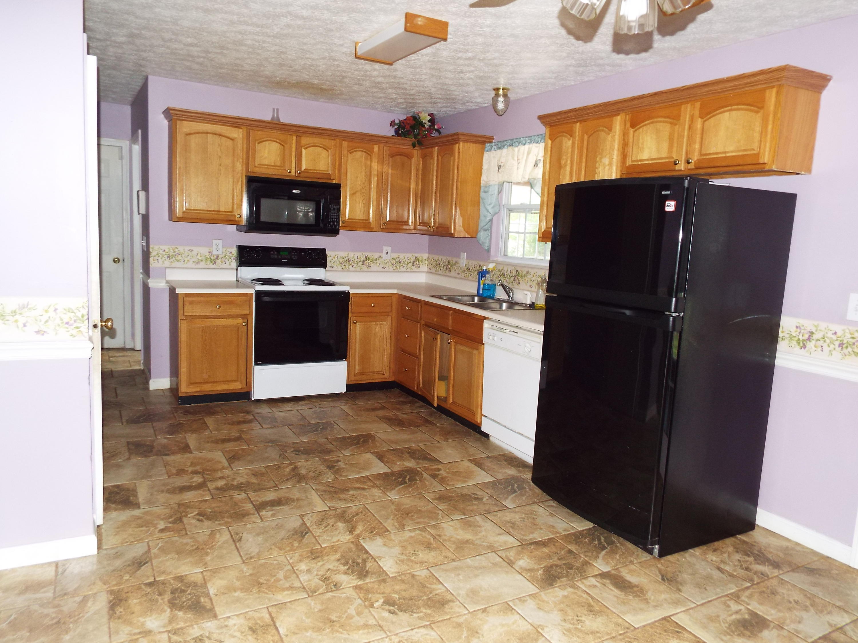 3610 Sams Road Rockford, TN 37853 - Photo 3 of 20 TILE FLOORS IN KITCHEN