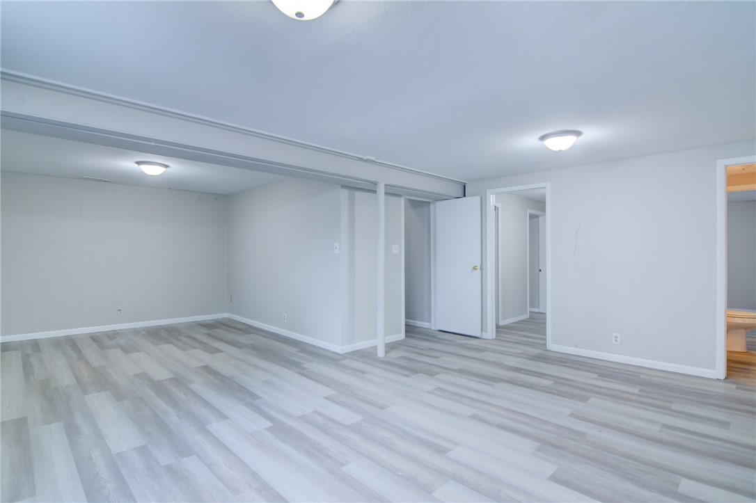 35 Whippoorwill Drive Decatur, IL 62526 - Photo 18 of 33 a view of an empty room and wooden floor