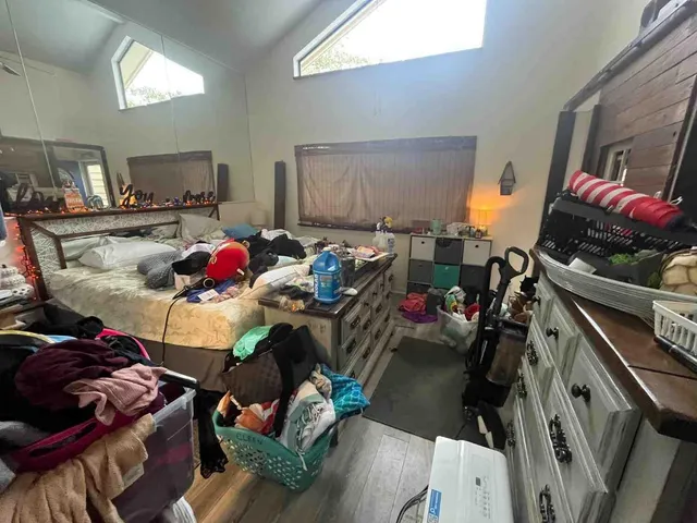 a room with furniture and a flat screen tv