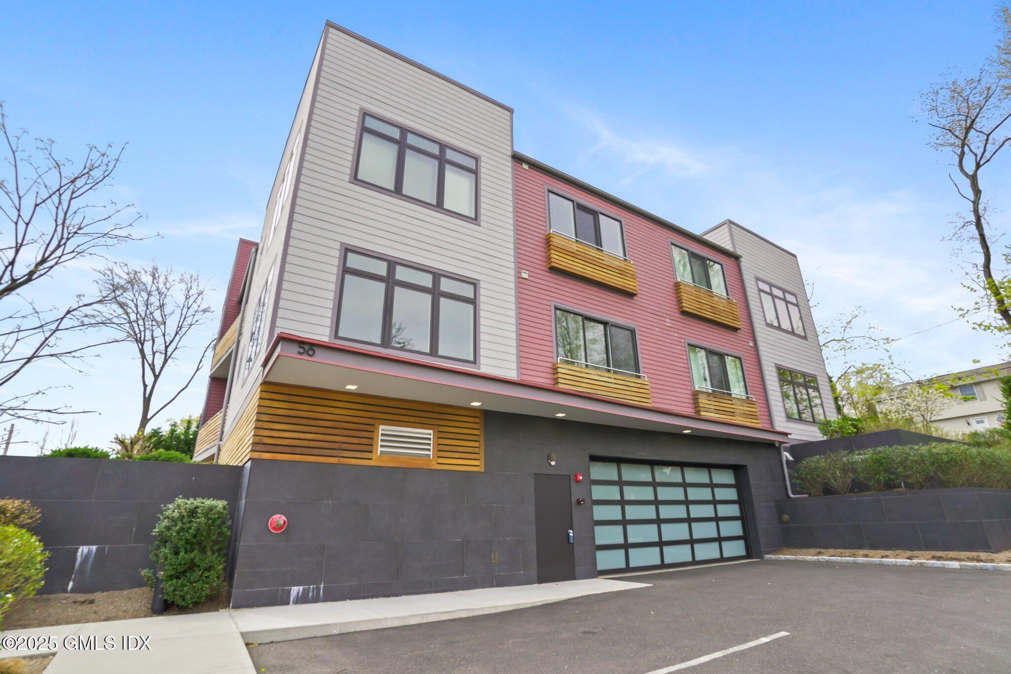 56 Old Field Point Road, Unit 1 Greenwich, CT 06830 - Photo 20 of 20 front view of a building