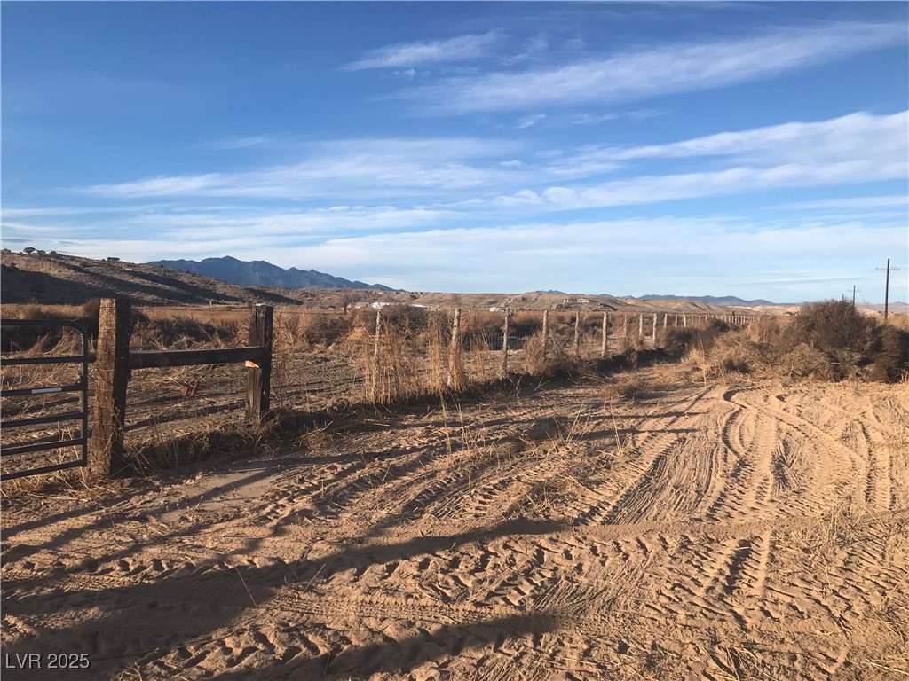 Quarter Horse Caliente, NV 89008 - Photo 2 of 13 View of yard with a mountain view and a rural view
