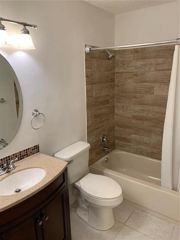 3502 Riverside Drive Coral Springs, FL 33065 - Photo 11 of 16 a bathroom with a sink a toilet and shower