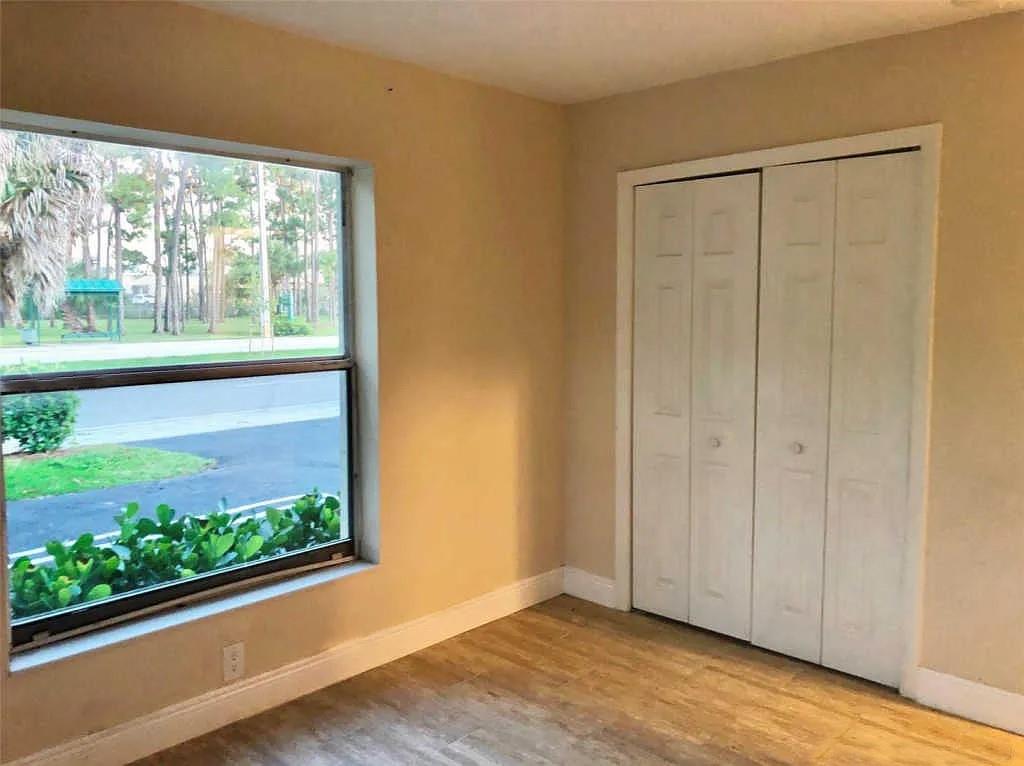 3502 Riverside Drive Coral Springs, FL 33065 - Photo 16 of 16 a view of a garden from a window