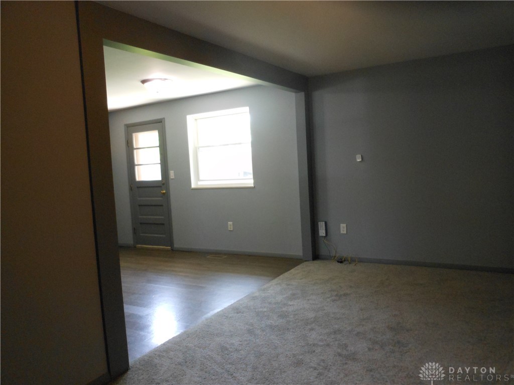 143 West Emerick Road West Milton, OH 45383 - Photo 16 of 37 This interior space offers a mix of flooring with a window providing natural light.