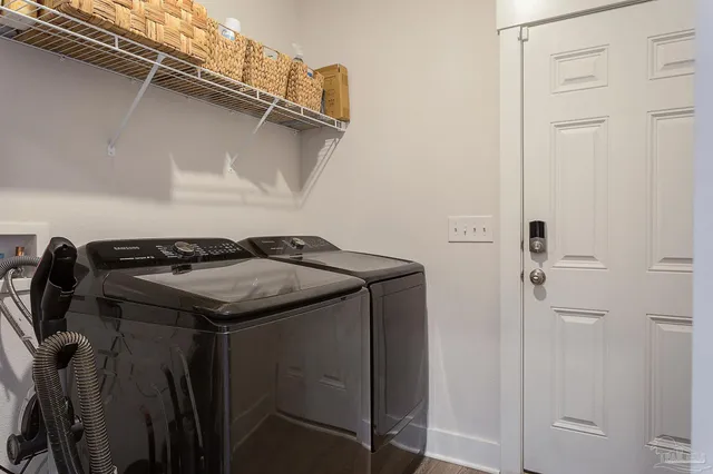 a utility room with dryer and washer