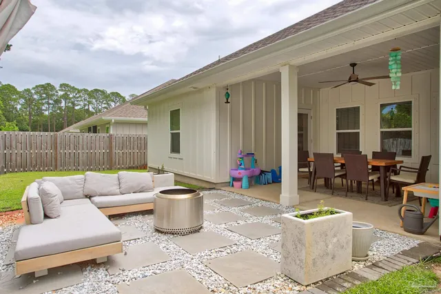 a outdoor living space with furniture and garden view