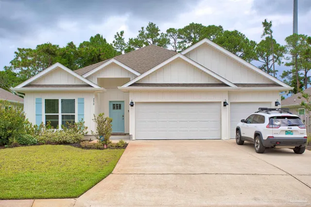 a house view with a garden space