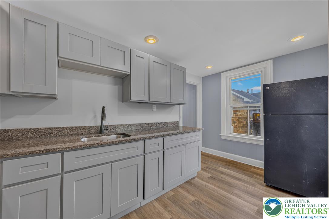 313 Main Street Slatington, PA 18080 - Photo 54 of 73 Functional kitchen with ample cabinet space and durable granite countertops for everyday living.