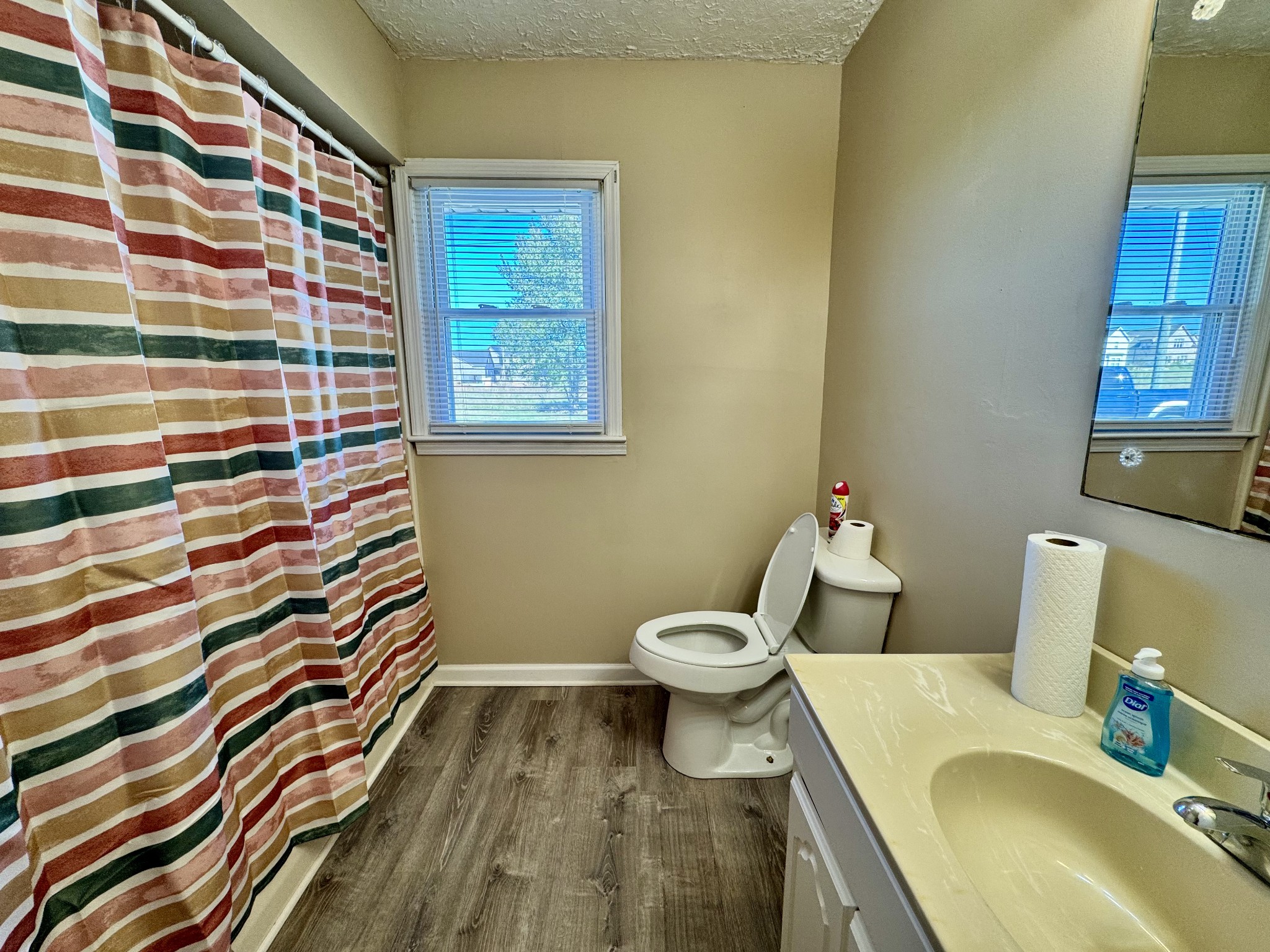 369 Burford Road Lebanon, TN 37087 - Photo 7 of 25 a bathroom with a sink toilet and shower