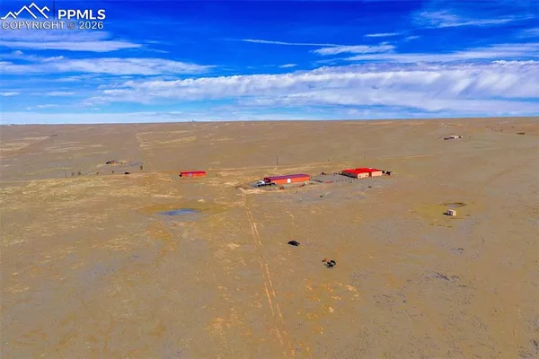 a view of a road with an ocean view