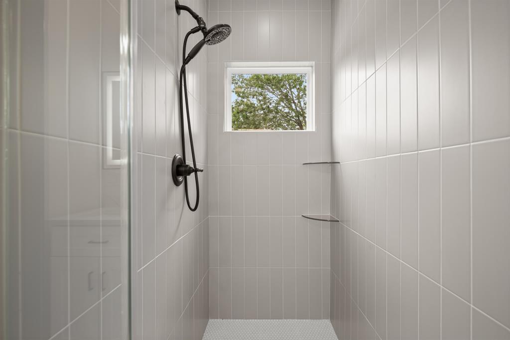 5305 Ledesma Road, Unit 4 Austin, TX 78721 - Photo 16 of 27 a bathroom with a shower