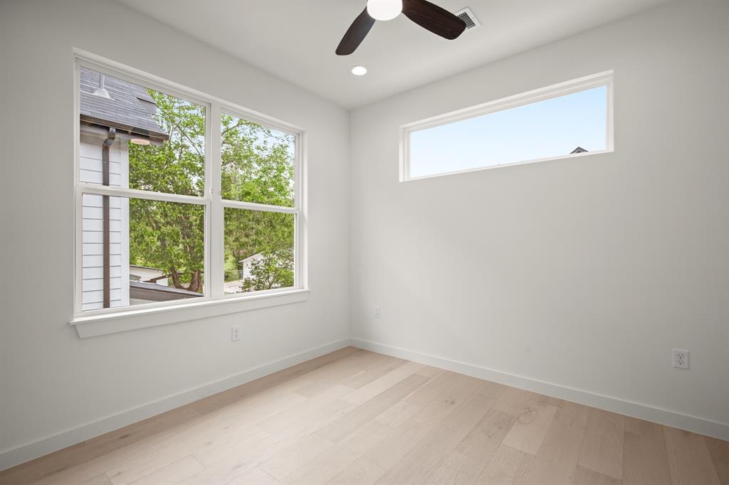 5305 Ledesma Road, Unit 4 Austin, TX 78721 - Photo 19 of 27 an empty room with a window