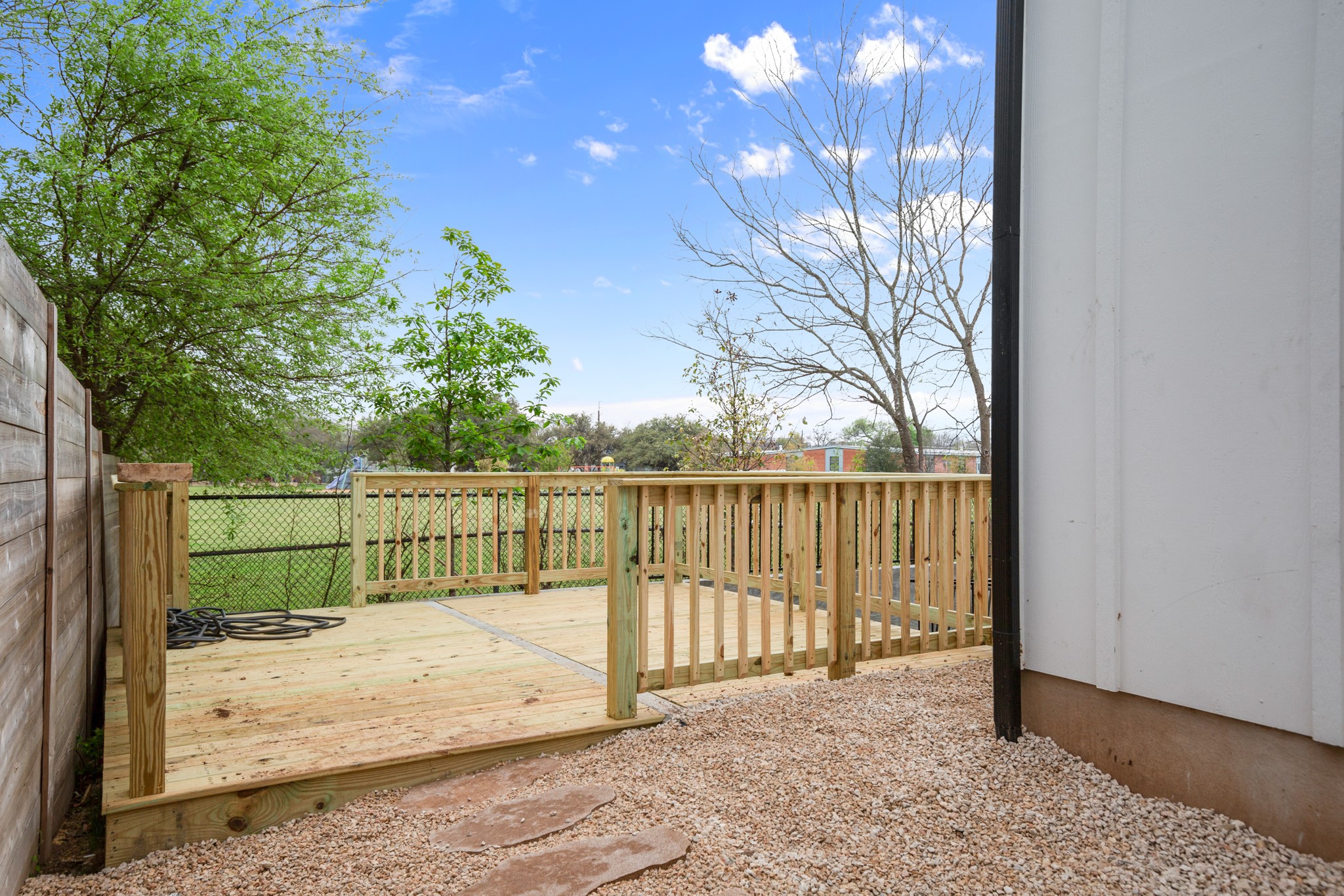 5305 Ledesma Road, Unit 4 Austin, TX 78721 - Photo 24 of 27 a view of a wrought fence next to a yard