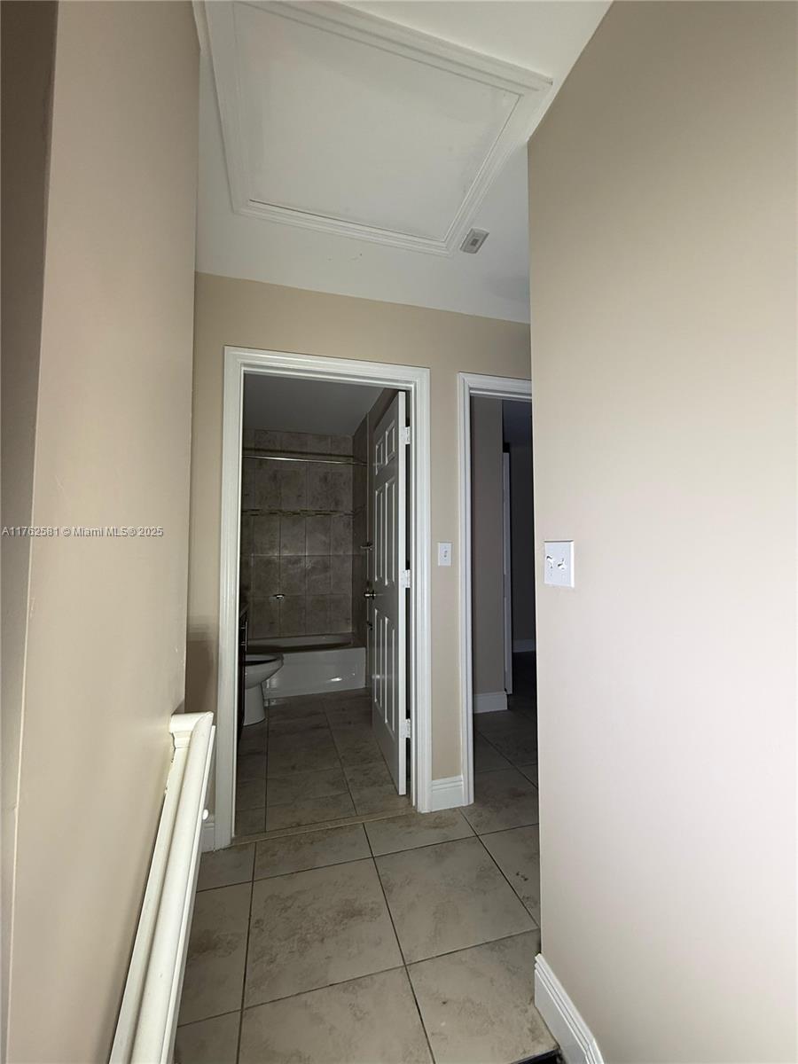 1990 Northwest 4th Court, Unit 7 Miami, FL 33136 - Photo 4 of 6 a view of a hallway