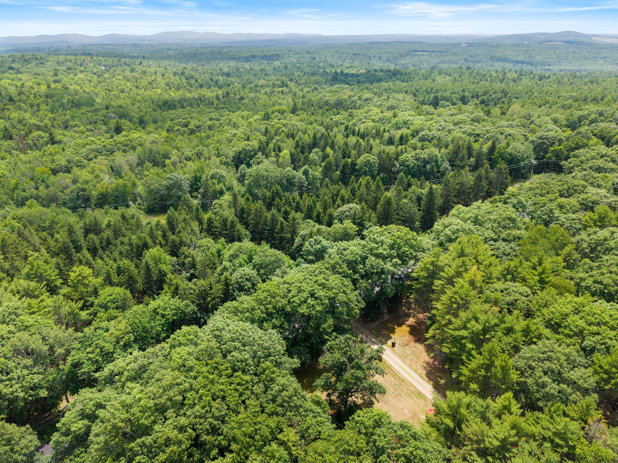 371 Bardon Hill Road Etna, ME 04434 - Photo 2 of 36 2-web-or-mls-DJI_20260709132032_0032_D