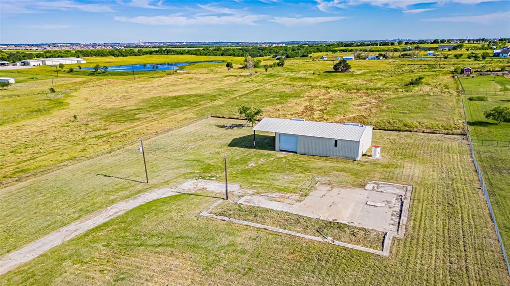 16634 Celina Road Celina, TX 75009 - Photo 17 of 22 View from above of property with a nearby body of water
