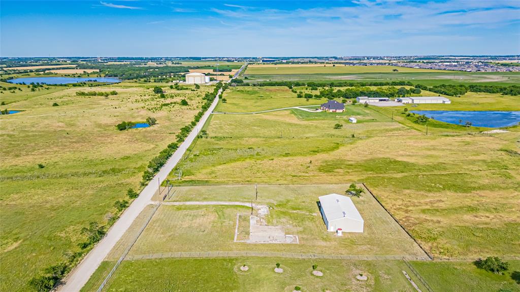 16634 Celina Road Celina, TX 75009 - Photo 22 of 22 View of rural area featuring a large body of water