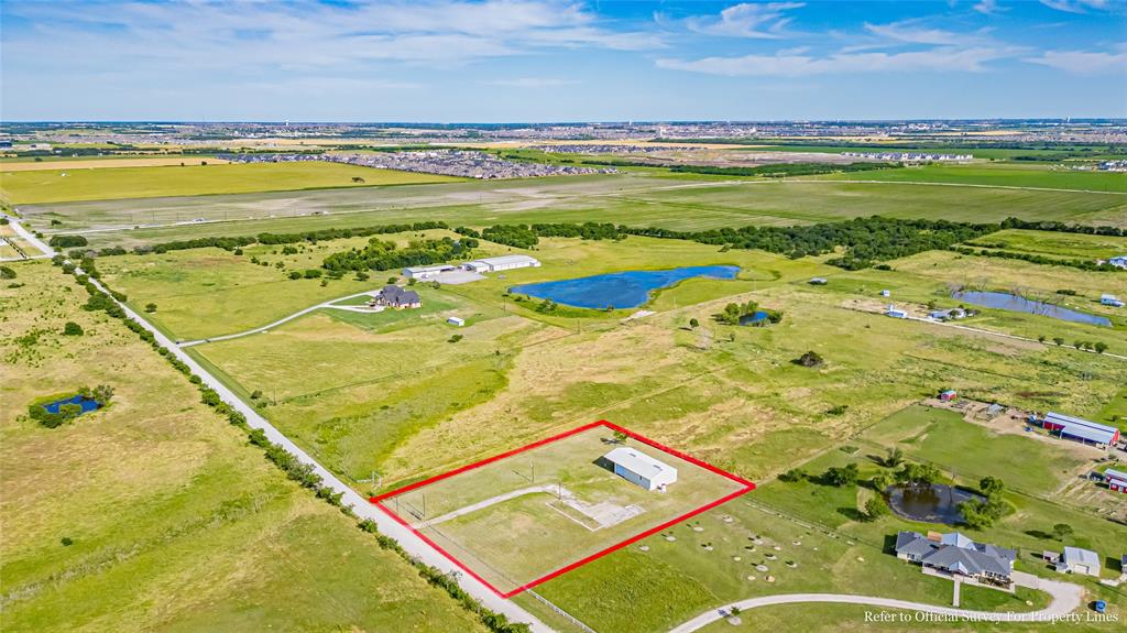 16634 Celina Road Celina, TX 75009 - Photo 10 of 22 Aerial view of property and surrounding area featuring a nearby body of water and property parcel outlined