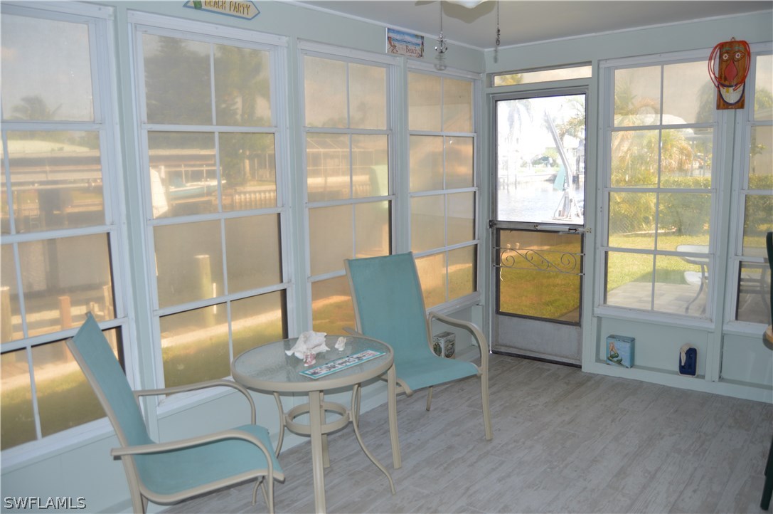 2822 Bruce Street Cape Coral, FL 33993 - Photo 17 of 20 a dining room with furniture and window