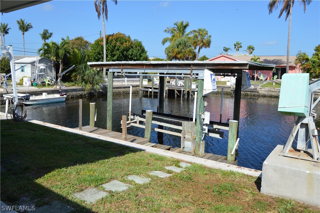 2822 Bruce Street Cape Coral, FL 33993 - Photo 7 of 20 swimming pool view with a seating space