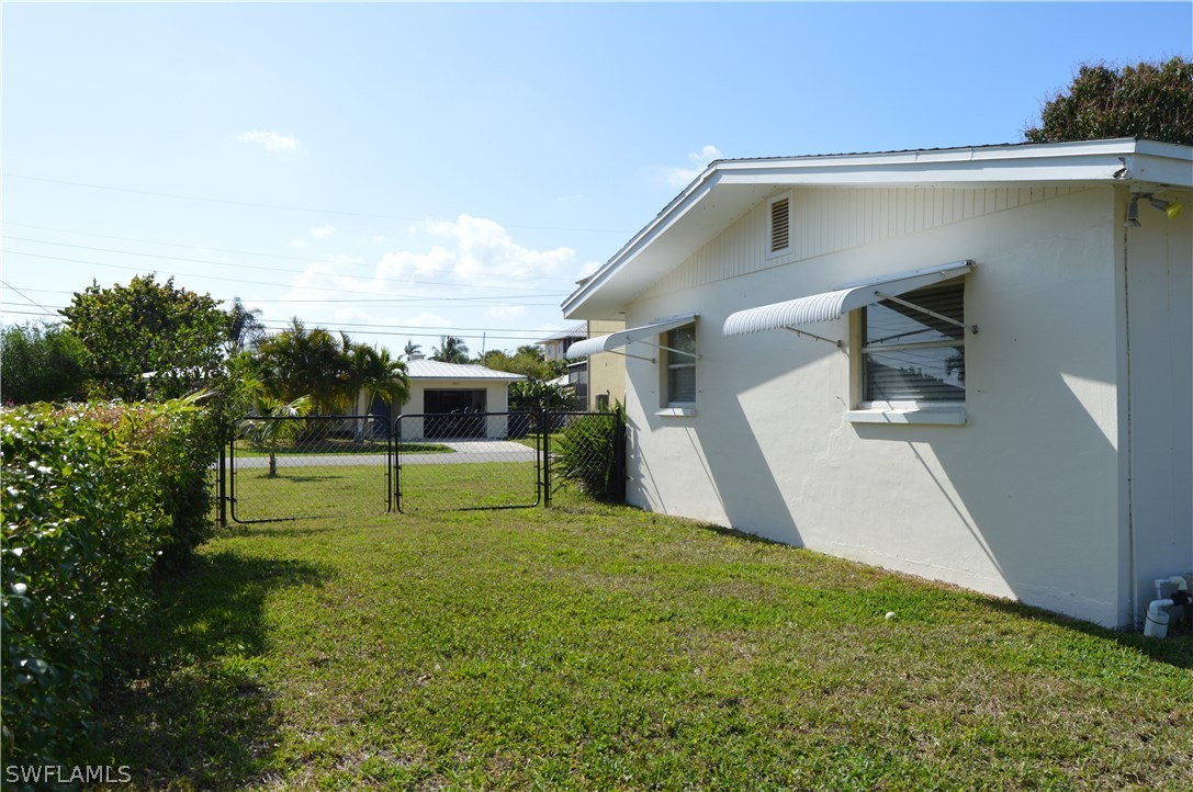 2822 Bruce Street Cape Coral, FL 33993 - Photo 8 of 20 a view of a back yard of the house