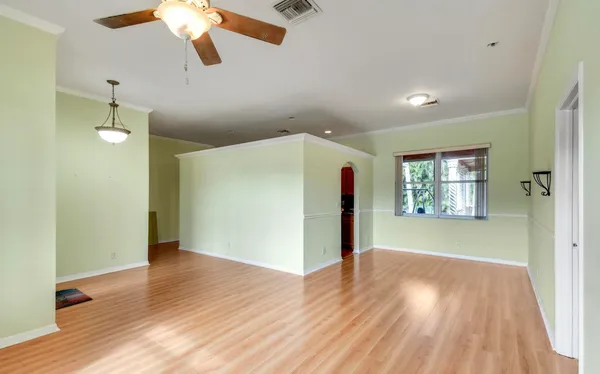 a view of an empty room with a window