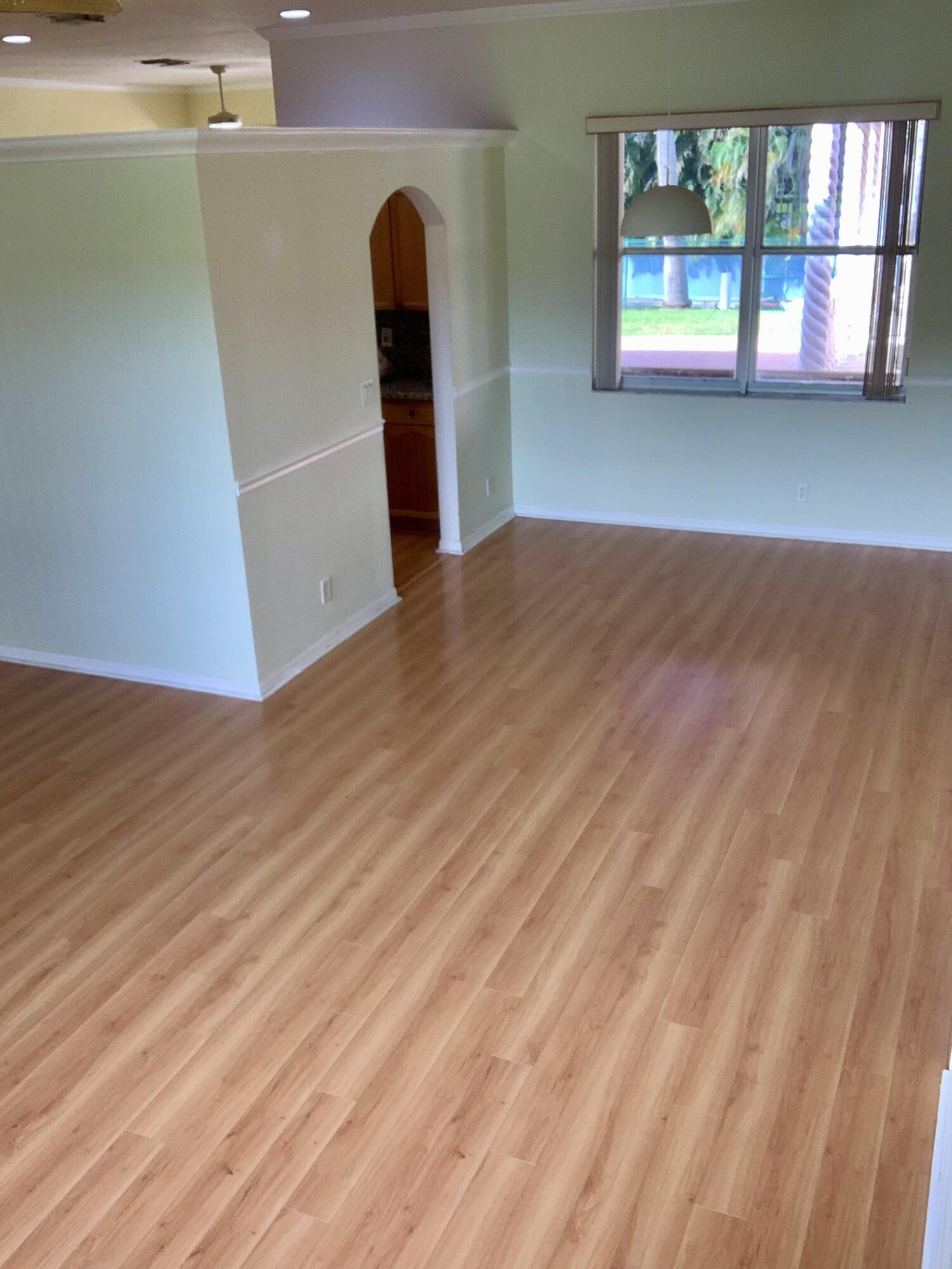 2215 Hypoluxo Road Lantana, FL 33462 - Photo 23 of 49 a view of an empty room with a window