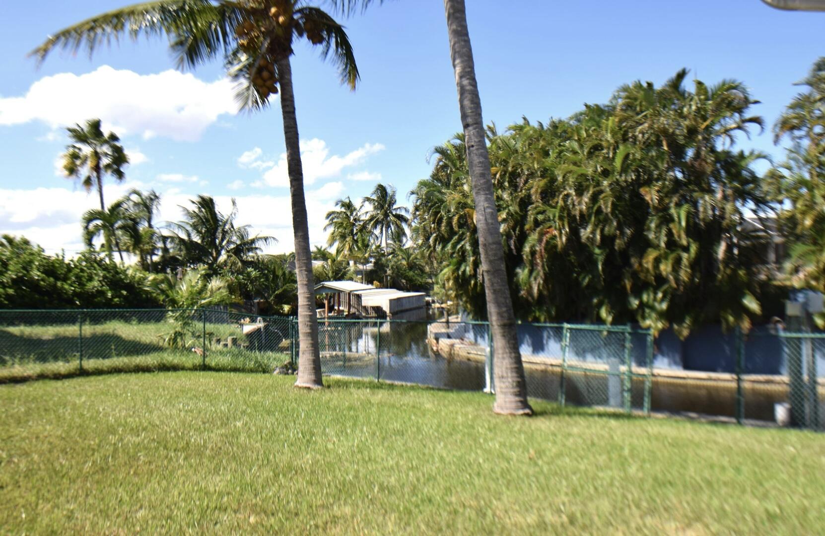 2215 Hypoluxo Road Lantana, FL 33462 - Photo 5 of 49 a view of a garden with a slide