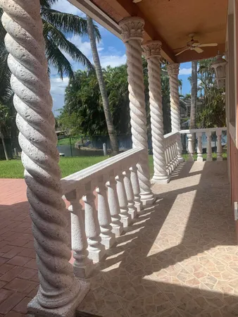 a view of a porch with a bench