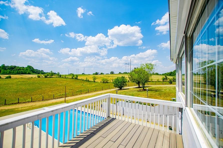 575 Liberty Church Road Carrollton, GA 30116 - Photo 65 of 95 a view of a balcony with wooden floor & fence