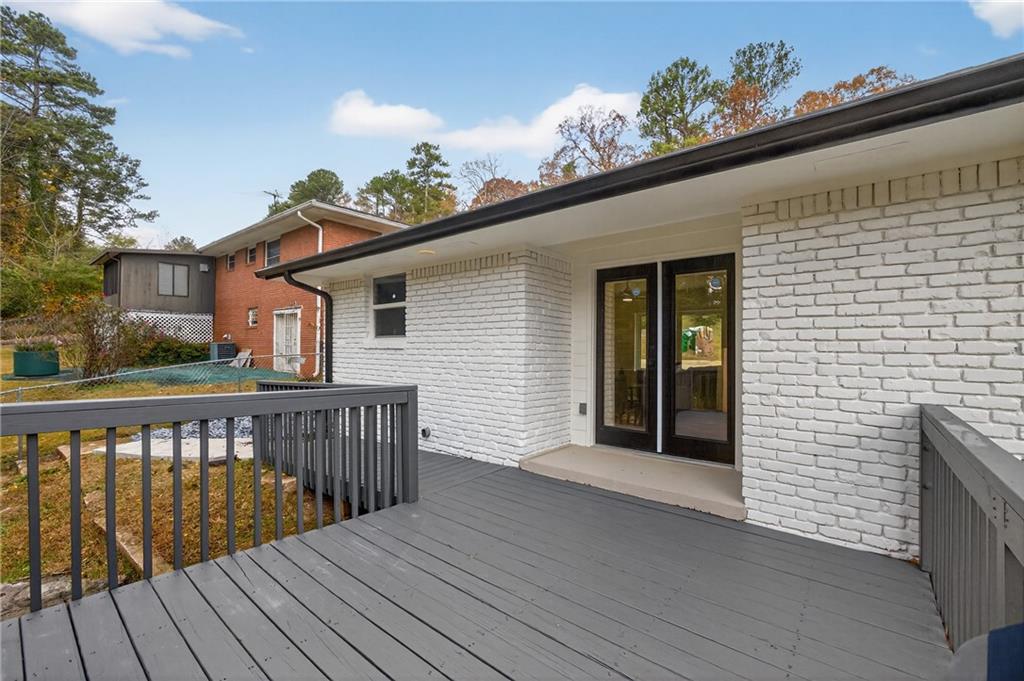2967 Flat Shoals Road Decatur, GA 30034 - Photo 19 of 37 a view of a balcony with wooden floor