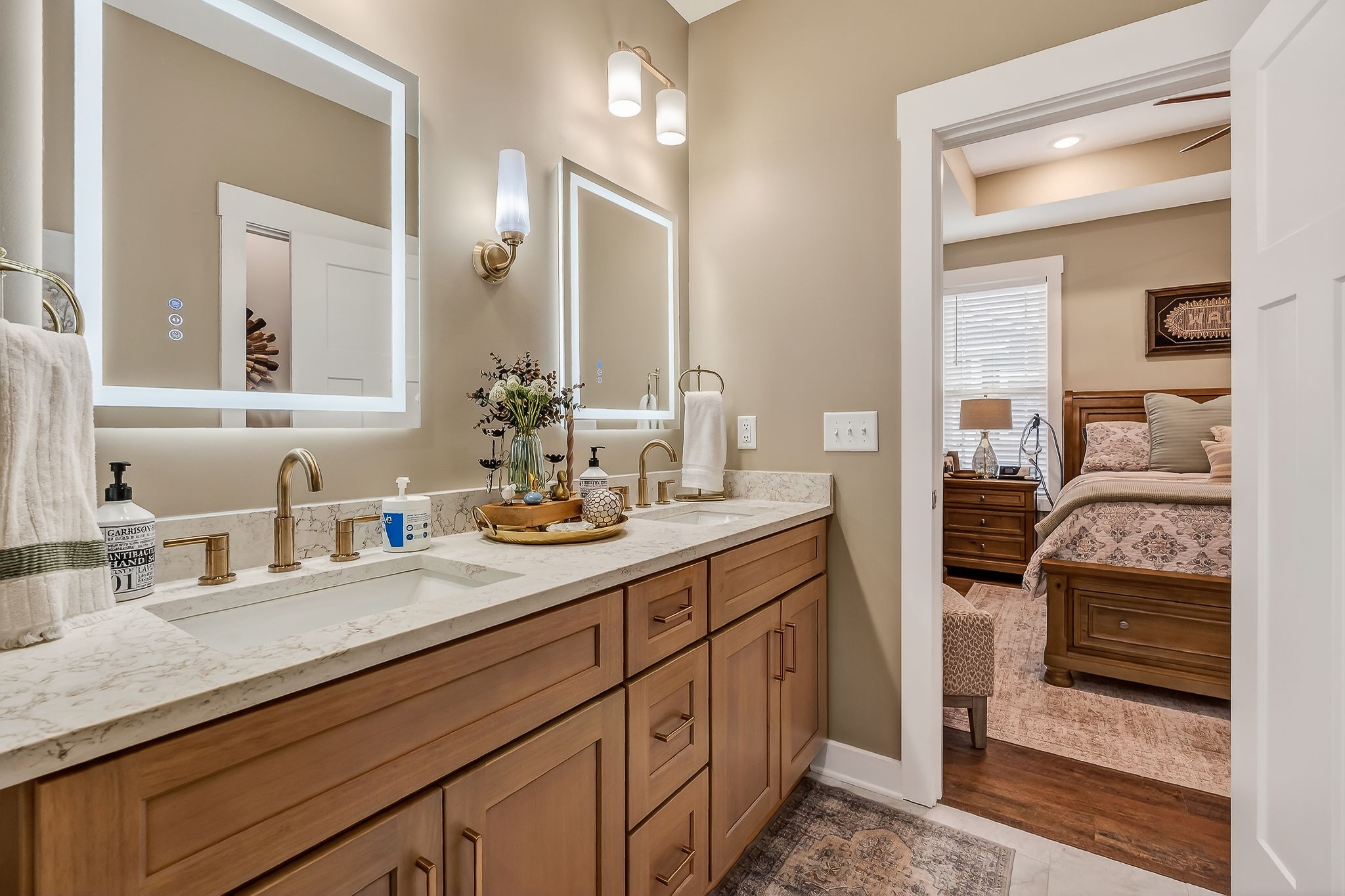 1073 Arch Cope Road Morrison, TN 37357 - Photo 16 of 42 a en suite bathroom with double sink and a mirror