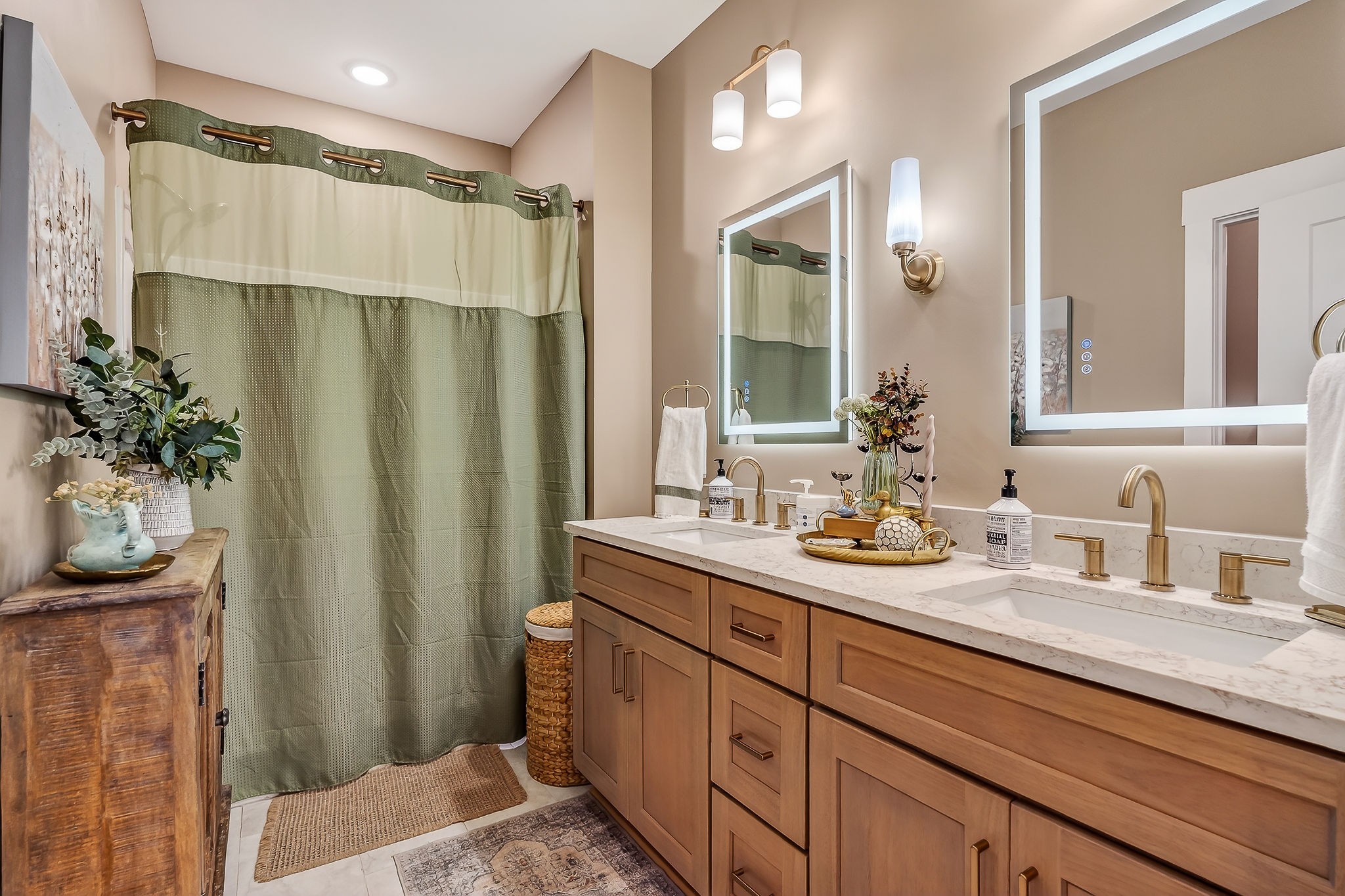 1073 Arch Cope Road Morrison, TN 37357 - Photo 17 of 42 a bathroom with a double vanity sink and mirror