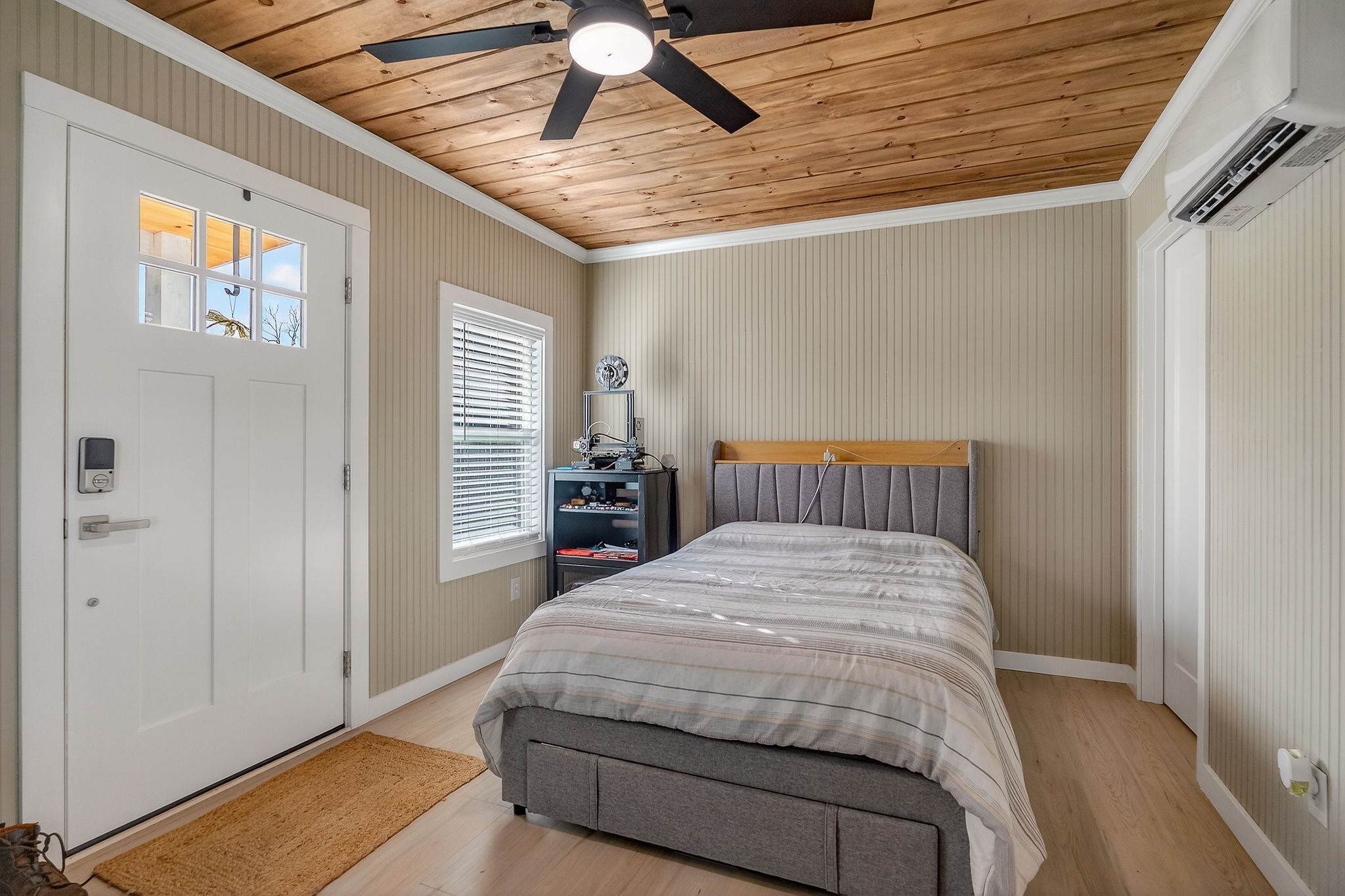 1073 Arch Cope Road Morrison, TN 37357 - Photo 33 of 42 a bedroom with a bed and a chandelier