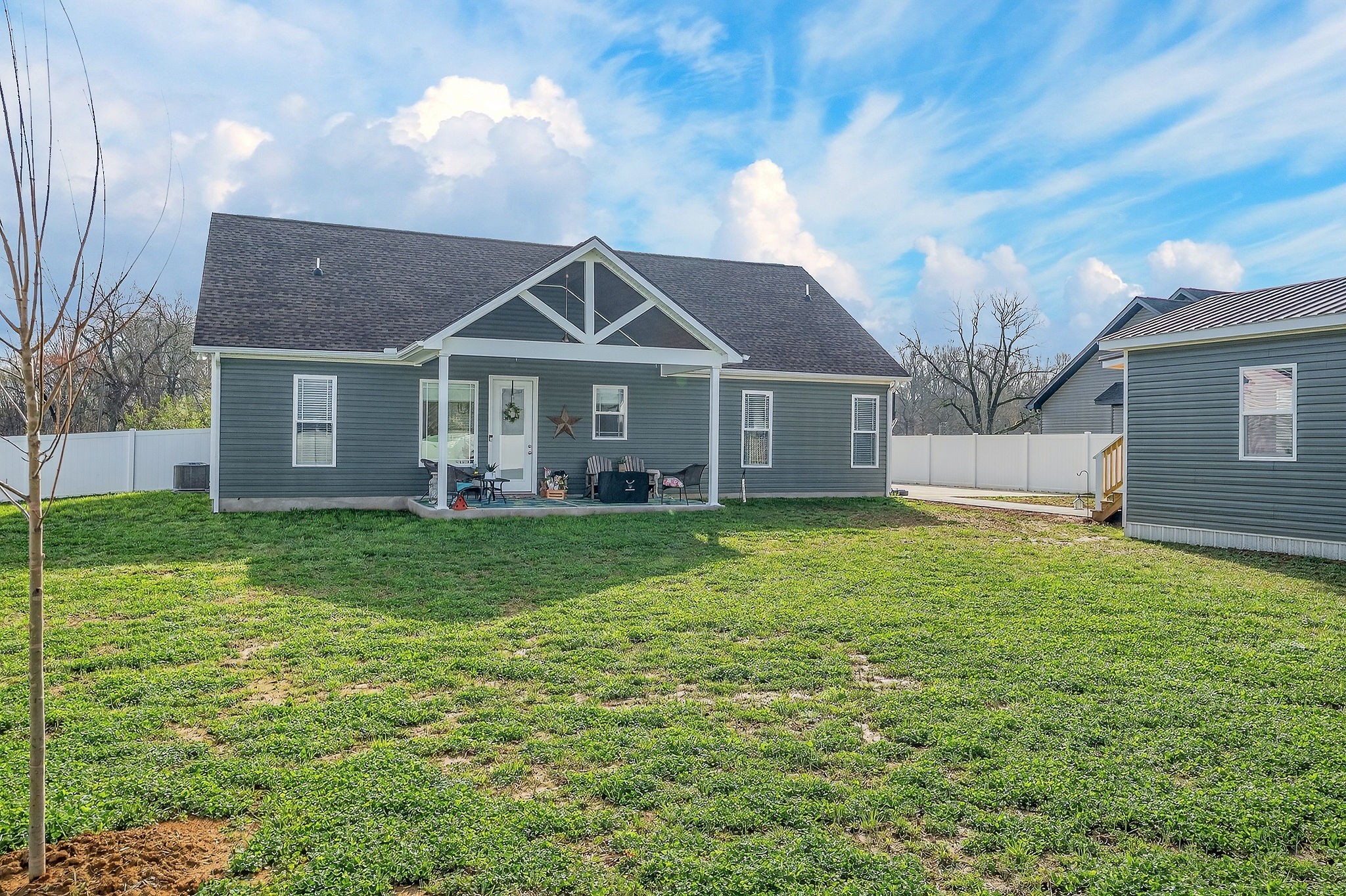 1073 Arch Cope Road Morrison, TN 37357 - Photo 40 of 42 a view of a house with a big yard plants and large trees