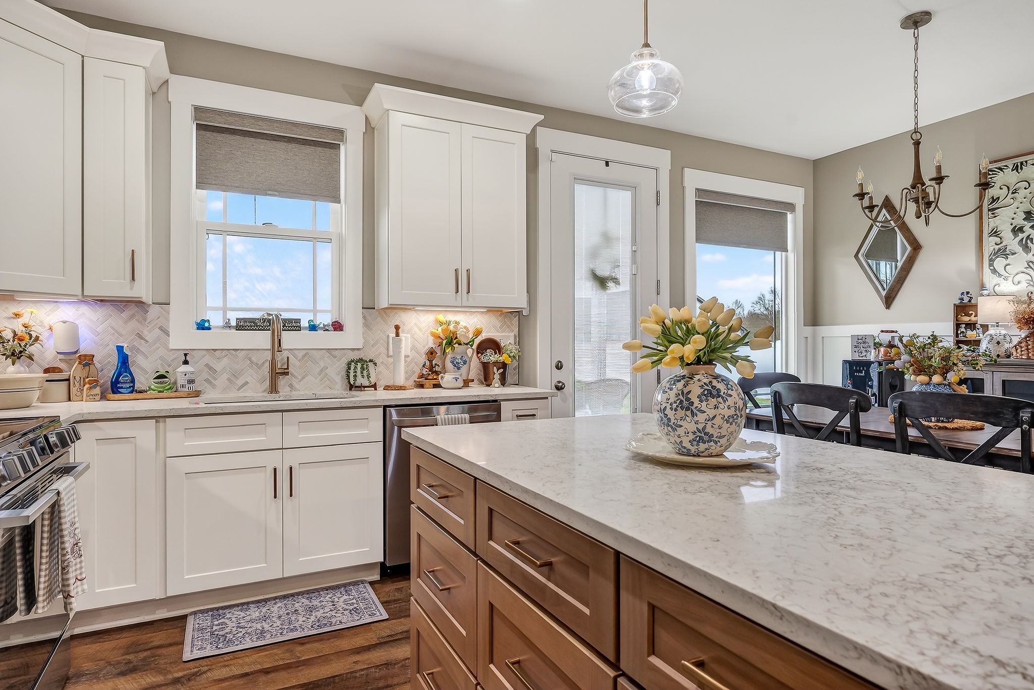 1073 Arch Cope Road Morrison, TN 37357 - Photo 7 of 42 a kitchen with sink cabinets and dining table