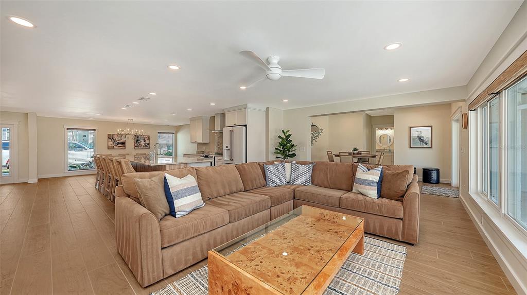 690 Old Compass Road Longboat Key, FL 34228 - Photo 22 of 69 a living room with furniture and a rug